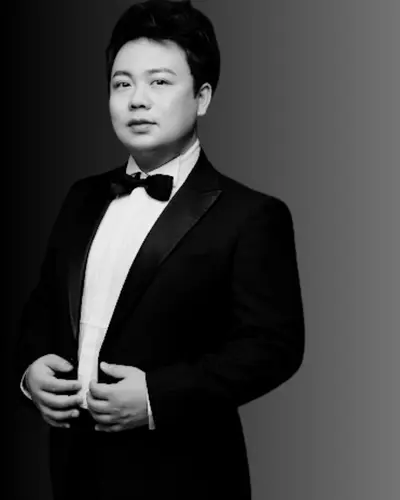 Black and white portrait of Tenor Chuan Wang, opera singer managed by Trucco Management