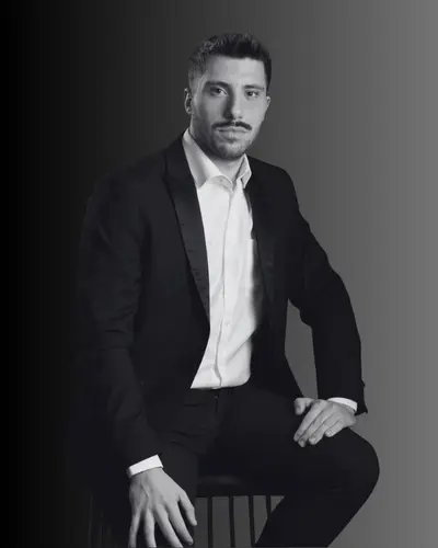 Black and white portrait of Tenor Francesco Lucii, opera singer managed by Trucco Management